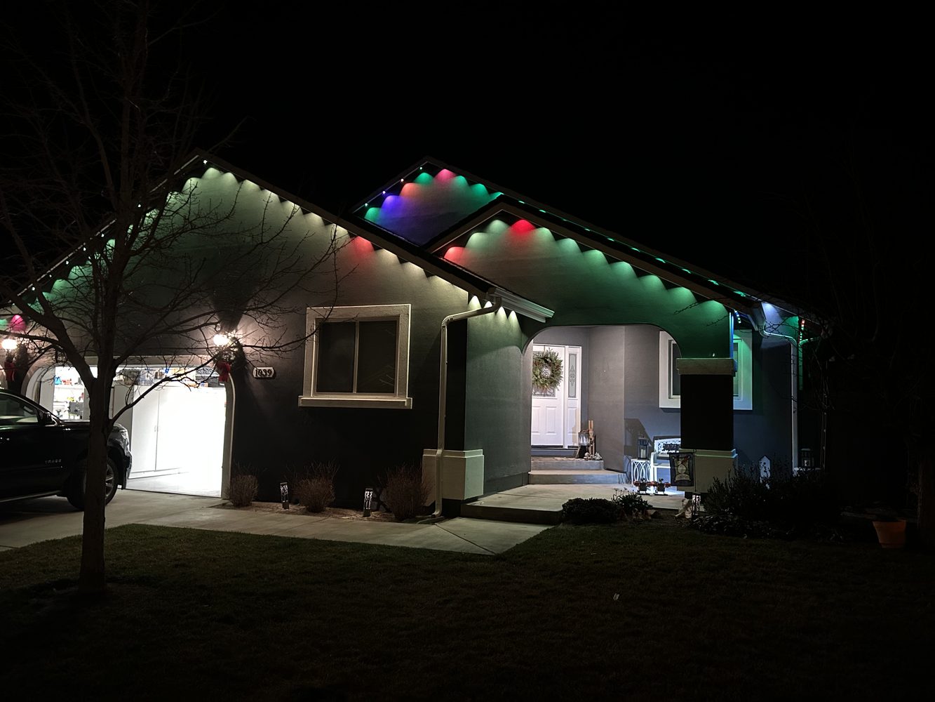 RNKS Services finished residential Christmas light display at night Reno Nevada