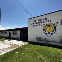 RNKS Services washing high school bleachers and football field stands